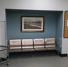 Four Seats and a Framed Photograph Four Seats and a Framed Photograph